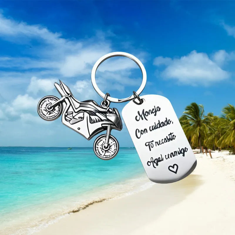 Stainless steel minimalist motorcycle keychain in a flannel gift bag.