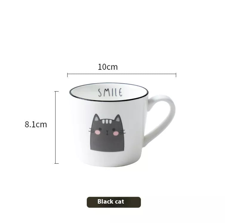 Ceramic coffee cup with cartoon cat design, perfect for couples and coffee enthusiasts