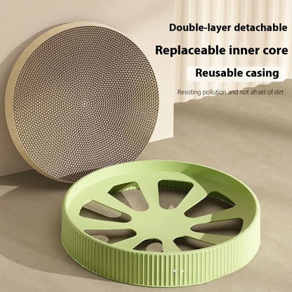 Round green cat scratching board measuring 55cm with corrugated paper surface and two replacement refills