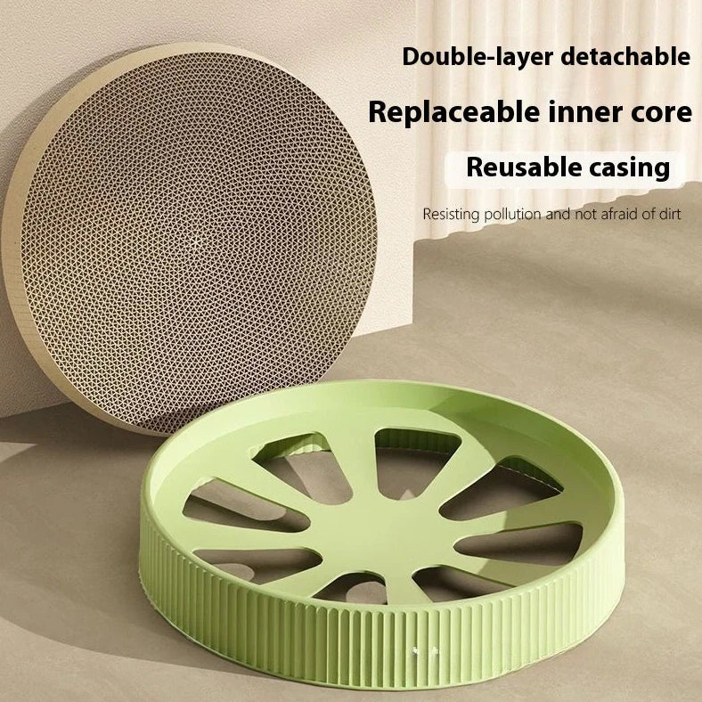 Green round cat scratching board measuring 55cm with corrugated paper surface and two replacement inserts