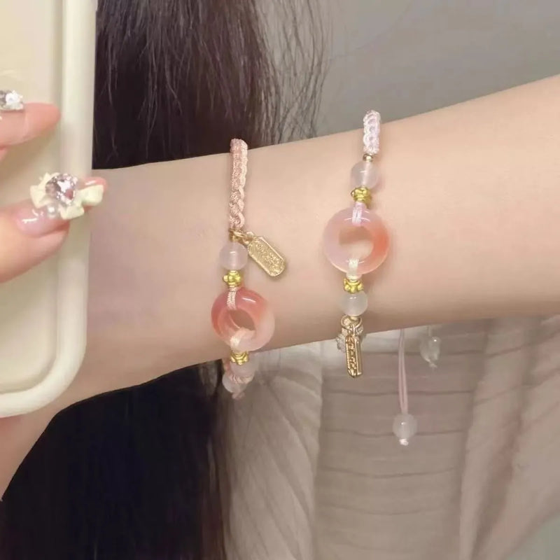 DIY woven watch band featuring peach blossom colour options, a unisex bracelet design crafted from mixed materials with national style elements in black, green, or pink finishes