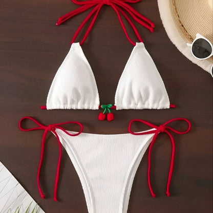 Solid colour briefs-style bikini swimsuit on a hanger, showing the top and pants.