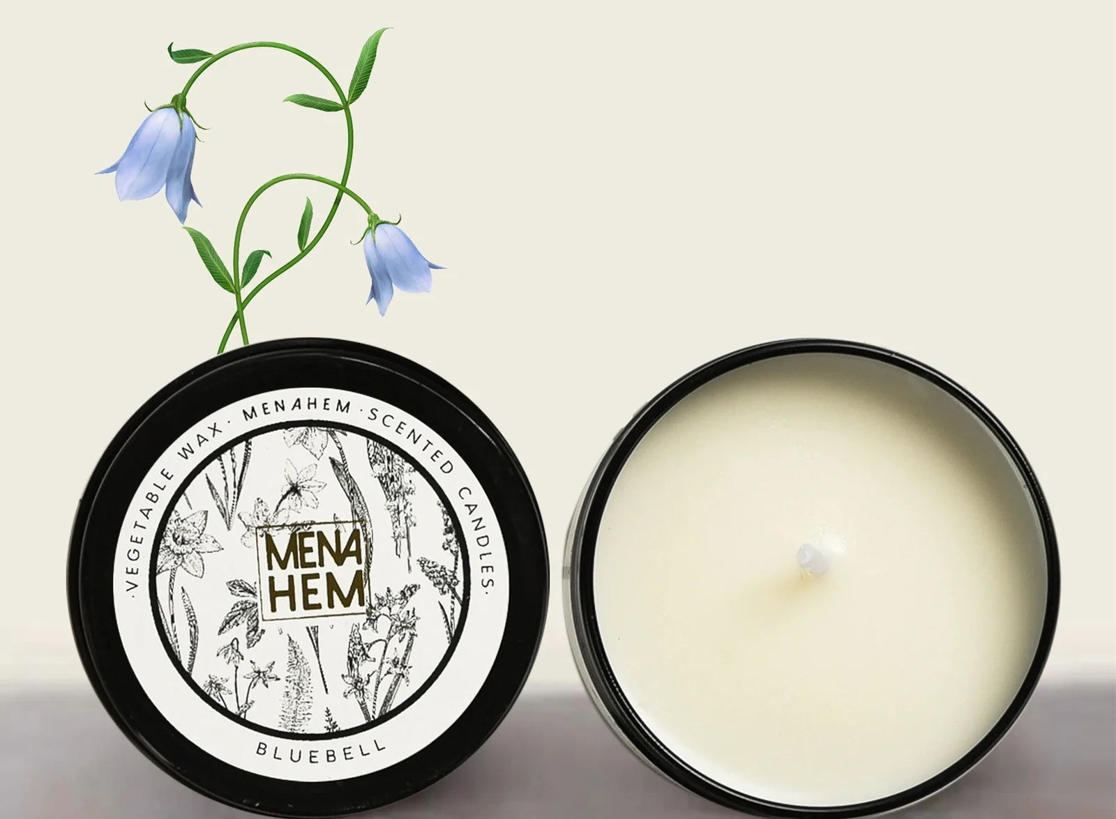 Black tin aromatic candle measuring 6cm diameter by 4cm height with soybean wax and natural wick