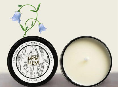 Black tin aromatic candle measuring 6cm diameter by 4cm height with soybean wax and natural wick