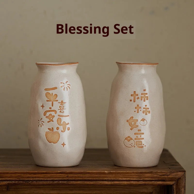 Hand-painted Chinese ceramic vase with carved detail on a desk, shown in Double Happiness colour design.