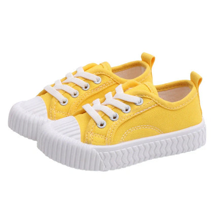 Korean style children's canvas shoes in black, red, yellow or white with non-slip rubber soles