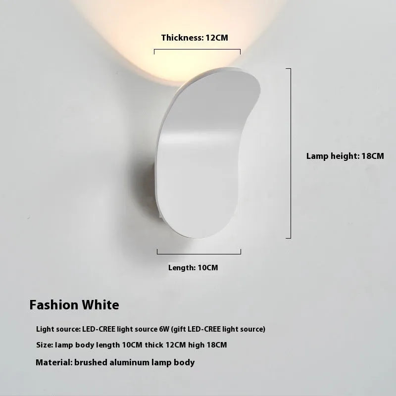 Brushed metal wall light bulb for living rooms in modern simplicity design with compact dimensions