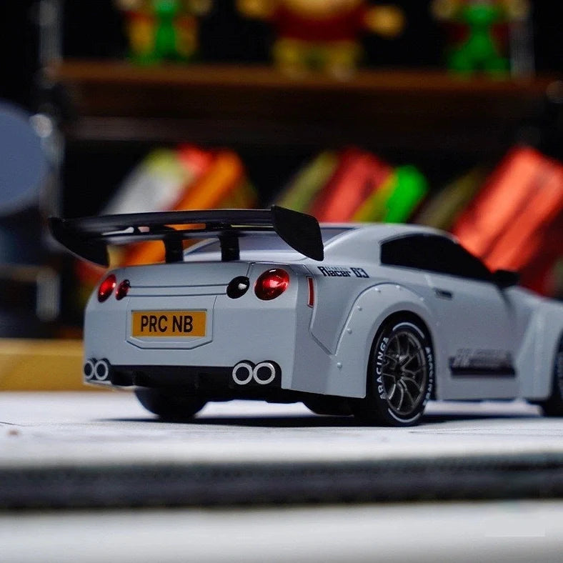 Proportional remote control drift car in Y914 cloudy blue colour with USB charging port visible