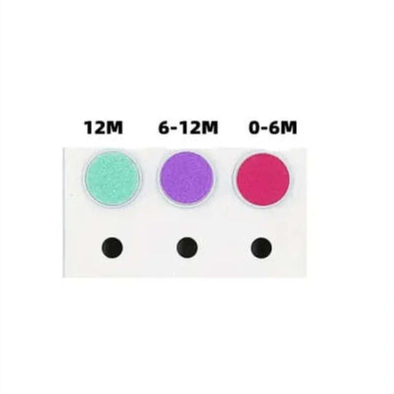 Baby Electric Nail Grinder in red and green with multiple grinding heads