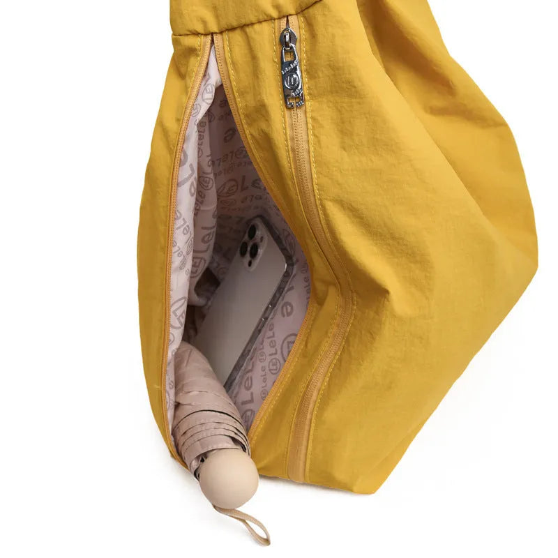 Underarm bag nylon large capacity heart shape women's shoulder bag available in four colours black blue khaki yellow for everyday carry and travel