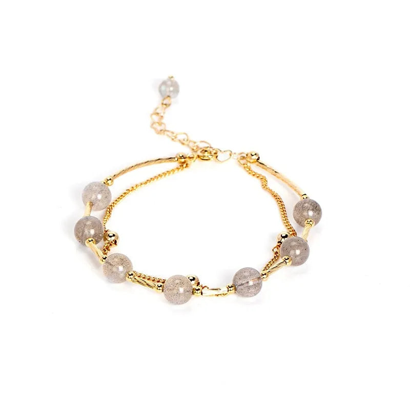 Women's electroplated crystal bracelet with moonstone charm and double copper tube design