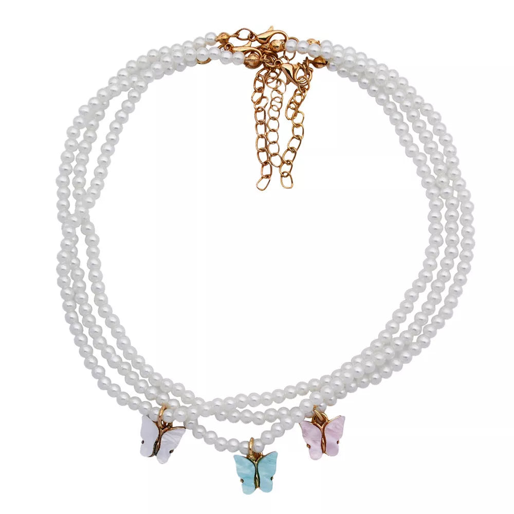 Elegant white pearl choker necklace with butterfly charm for women