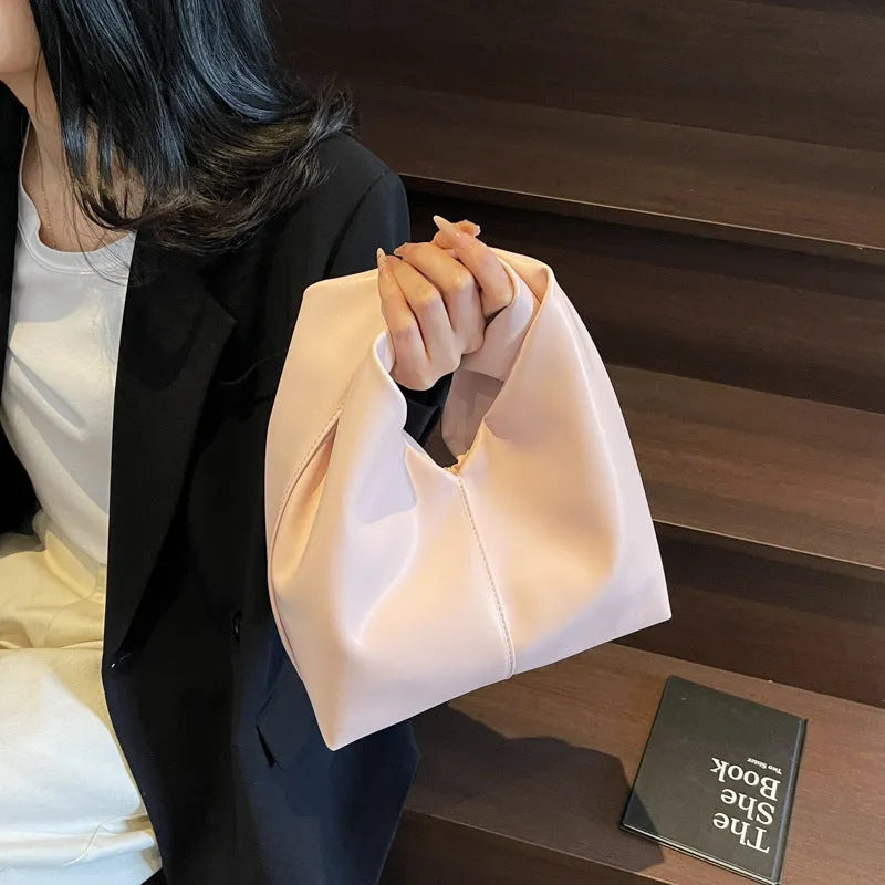 Women's handbag casual cloud spring summer new simple design dumpling-shaped PU bag with sandwich pocket, available in black, white, brown, pink, khaki and wine red, featuring mobile phone and file compartments, folded stitching details.