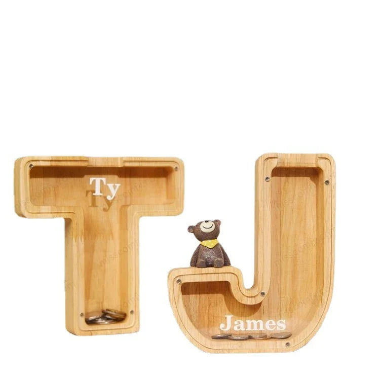 Wooden letter-shaped coin bank with clear glass panel to watch savings grow, a decorative and functional home accent.