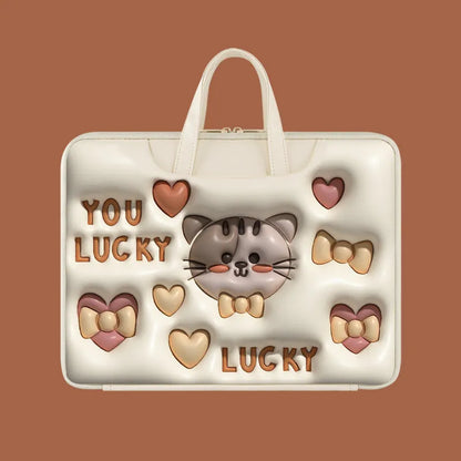 PU leather inflatable laptop bag with strap, shown in a cartoon pattern design, hanging from a suitcase handle.