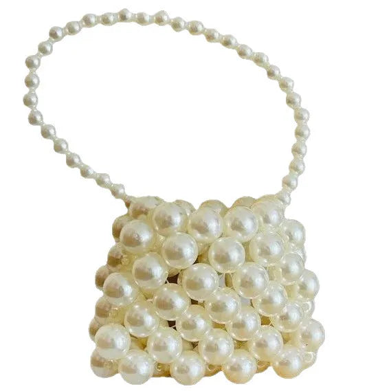 Women's imitation pearl mini crossbody handbag with geometric pattern in a pearl colour.