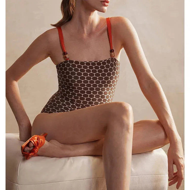 Women's one-piece swimsuit with wrap skirt in dots pattern design