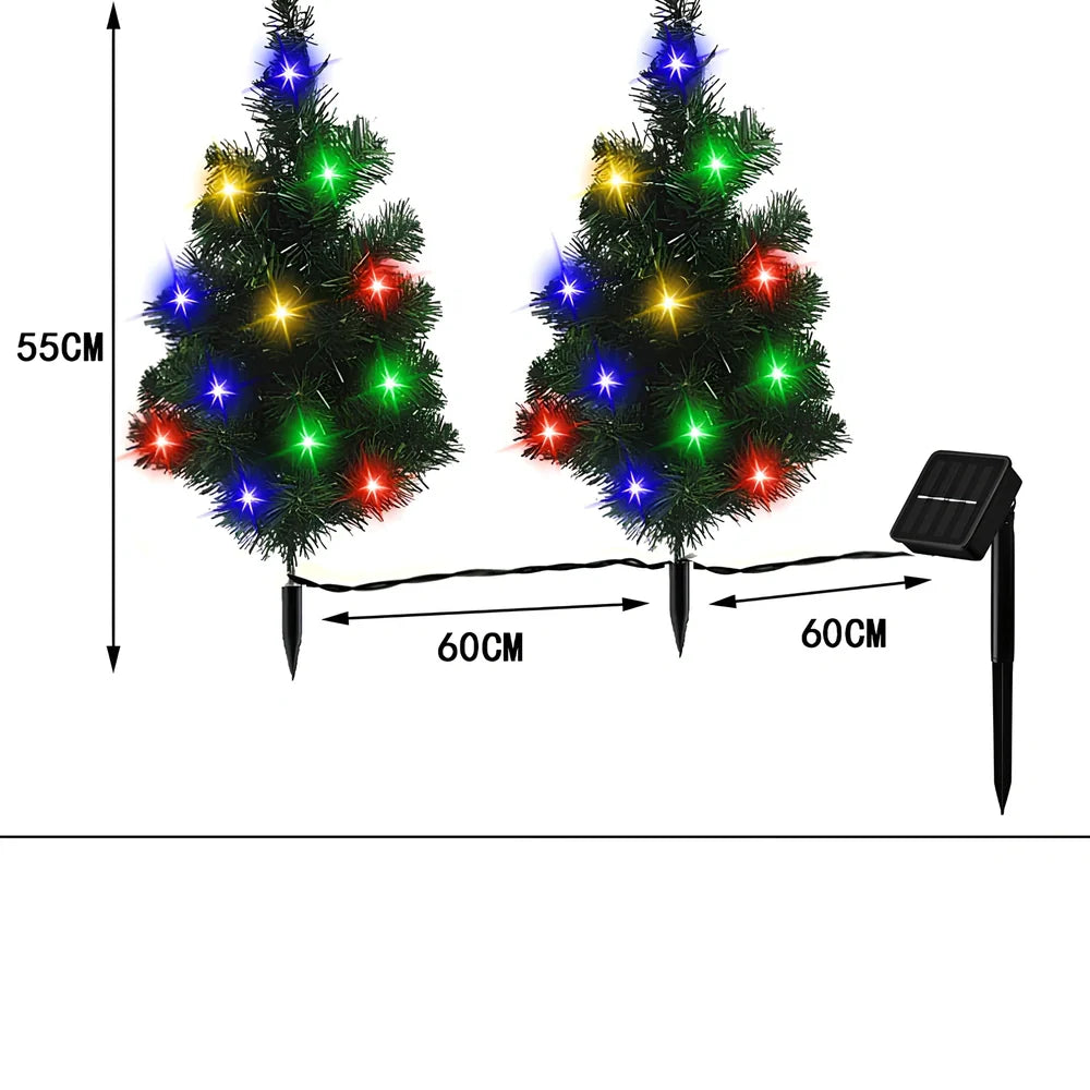 Solar-powered Christmas tree garden light with green ABS construction and warm white LED illumination