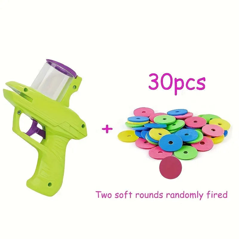 Green battery-free cat toy launcher with foam disc for interactive pet play