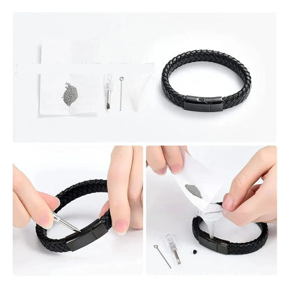 Black leather and stainless steel men's casket bracelet with engraved letters in a woven design.