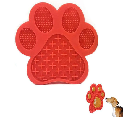 Blue bone-shaped dog licking mat with suction cups on a smooth surface, measuring 18x18cm
