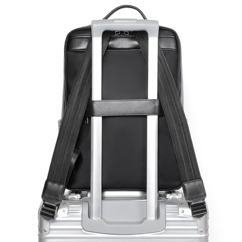 Men's genuine cowhide leather computer backpack in black with 36-55 litre capacity