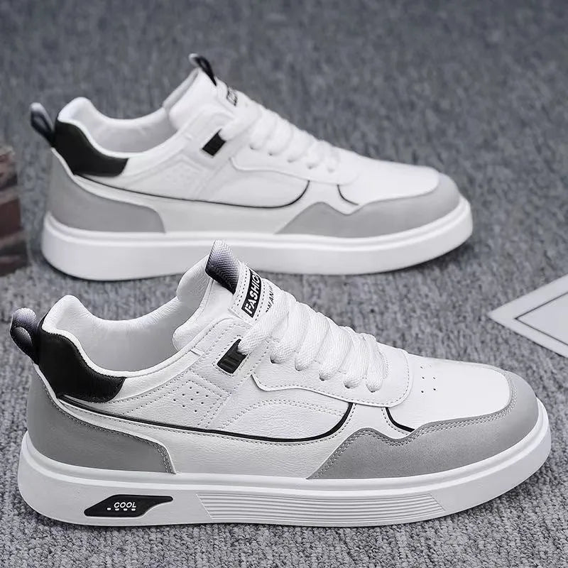 Low-top canvas board shoes in beige with mesh lining and leather stitching details on a solid background