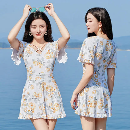 Women's high waist one-piece swimsuit with floral pattern in white flowers or blue design