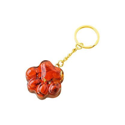 Natural crystal cat's paw keychain pendant showing gemstone options with integrated attachment loop