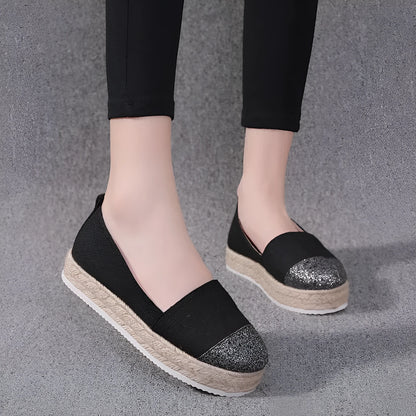 Breathable canvas slip-on flat shoes in black and white colours on a size chart showing 35 to 43.