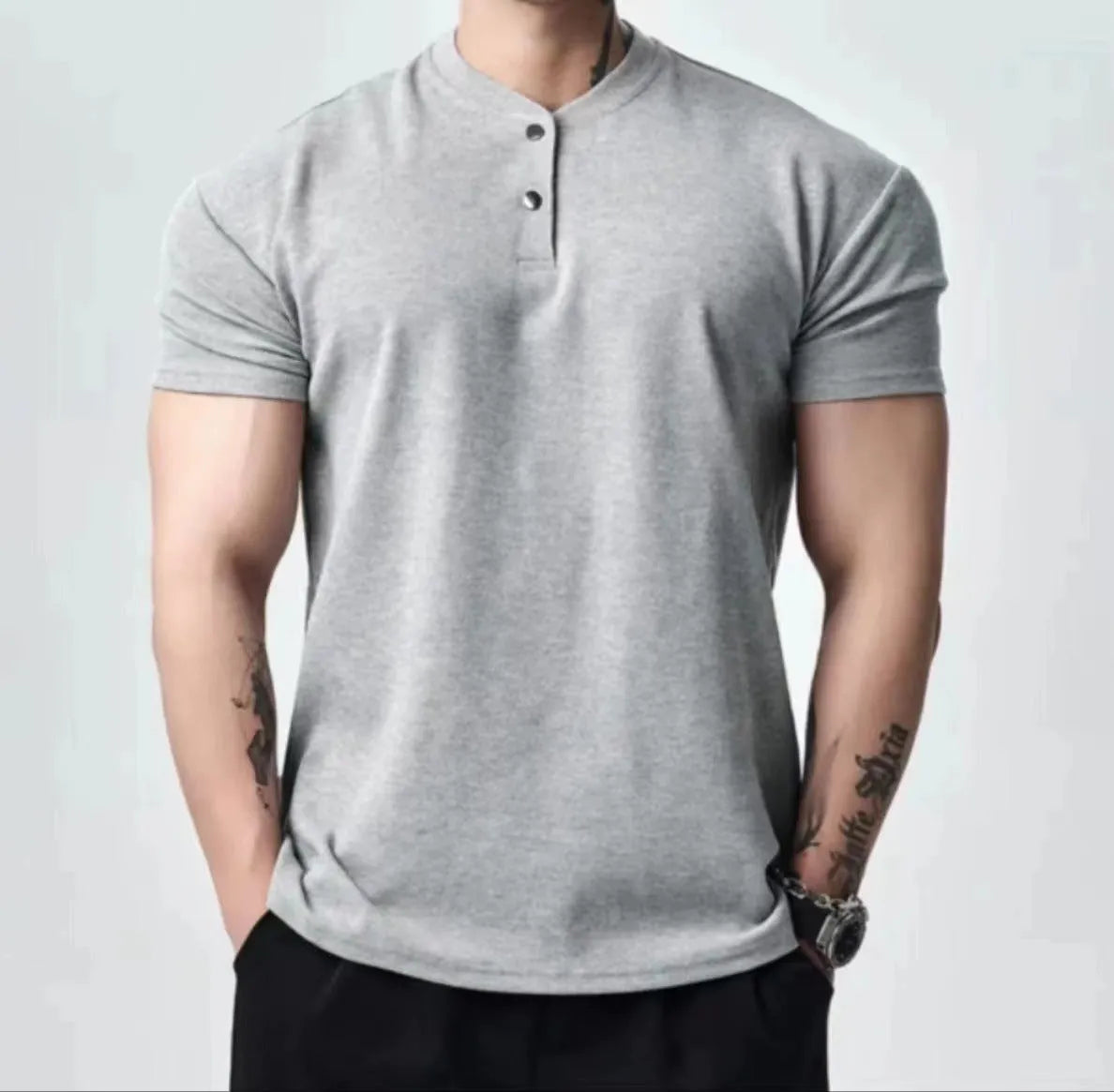 Men's loose fit retro T-shirt shown in black with a Henry collar on a mannequin.