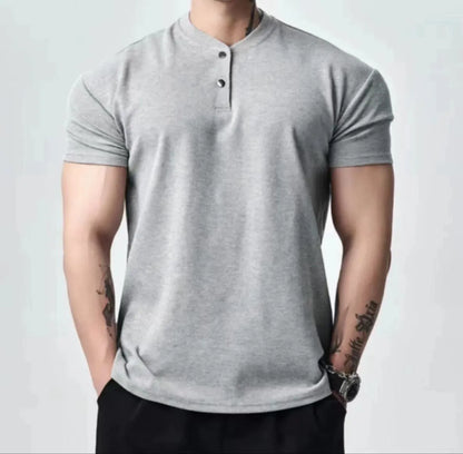 Men's loose fit retro T-shirt shown in black with a Henry collar on a mannequin.