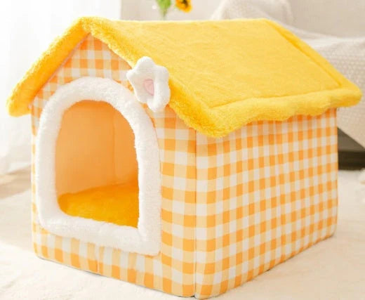 A cozy and comfortable pet bed with a self-warming fabric, durable non-slip base, and removable machine-washable cover