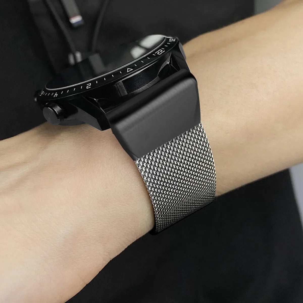 Stainless steel card strap for Garmin Fenix watch showing integrated card slot and buckle closure