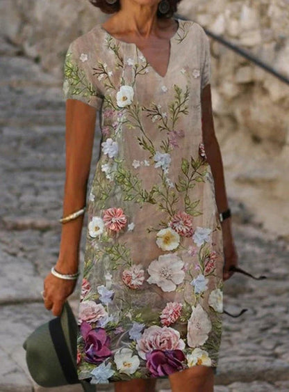 Stylish floral printed mid-length dress made with a cotton-linen blend fabric for a comfortable and feminine look.
