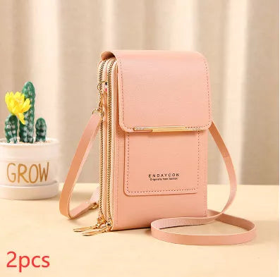 Women's messenger touch screen phone bag in solid colors with diamond decorative elements