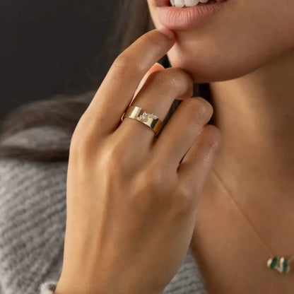 Women's copper ring with electroplated gold finish and shining zircon accents on finger