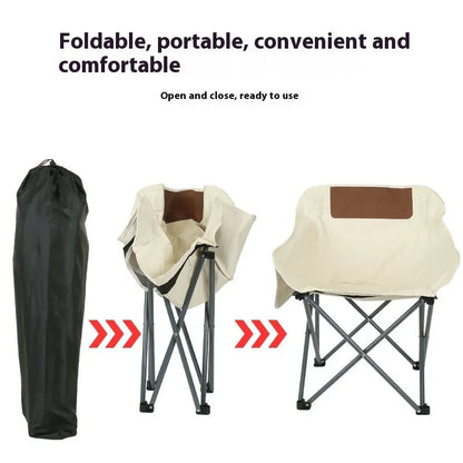 Portable folding camping chair with steel frame and Oxford fabric in outdoor setting