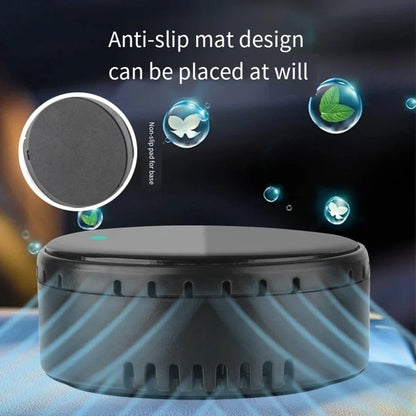 Black solar-powered car humidifier mounted on air conditioning vent with water mist visible