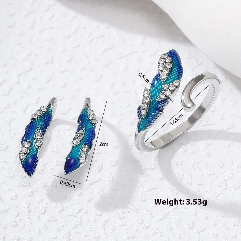 Bright blue feather earring and ring set in lightweight alloy with electroplated finish