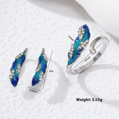 Bright blue feather earring and ring set in lightweight alloy with electroplated finish