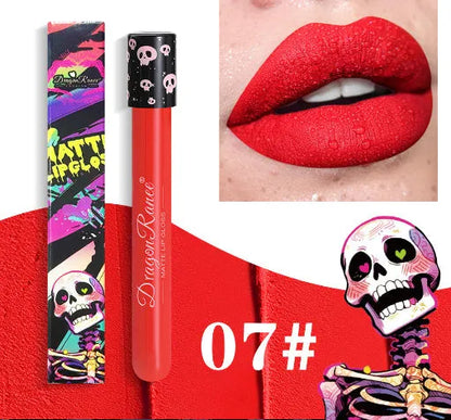 Halloween skull test tube lip gloss in gold and silver matte metallic shades showing doe-foot applicator.