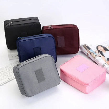 Stylish portable makeup bag with waterproof divider, multi-compartment storage, and variety of color options