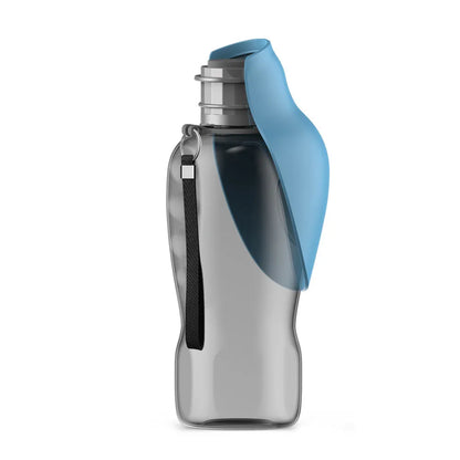 Blue grey portable dog water bottle with foldable drinking bowl and wrist strap, shown next to a dog.