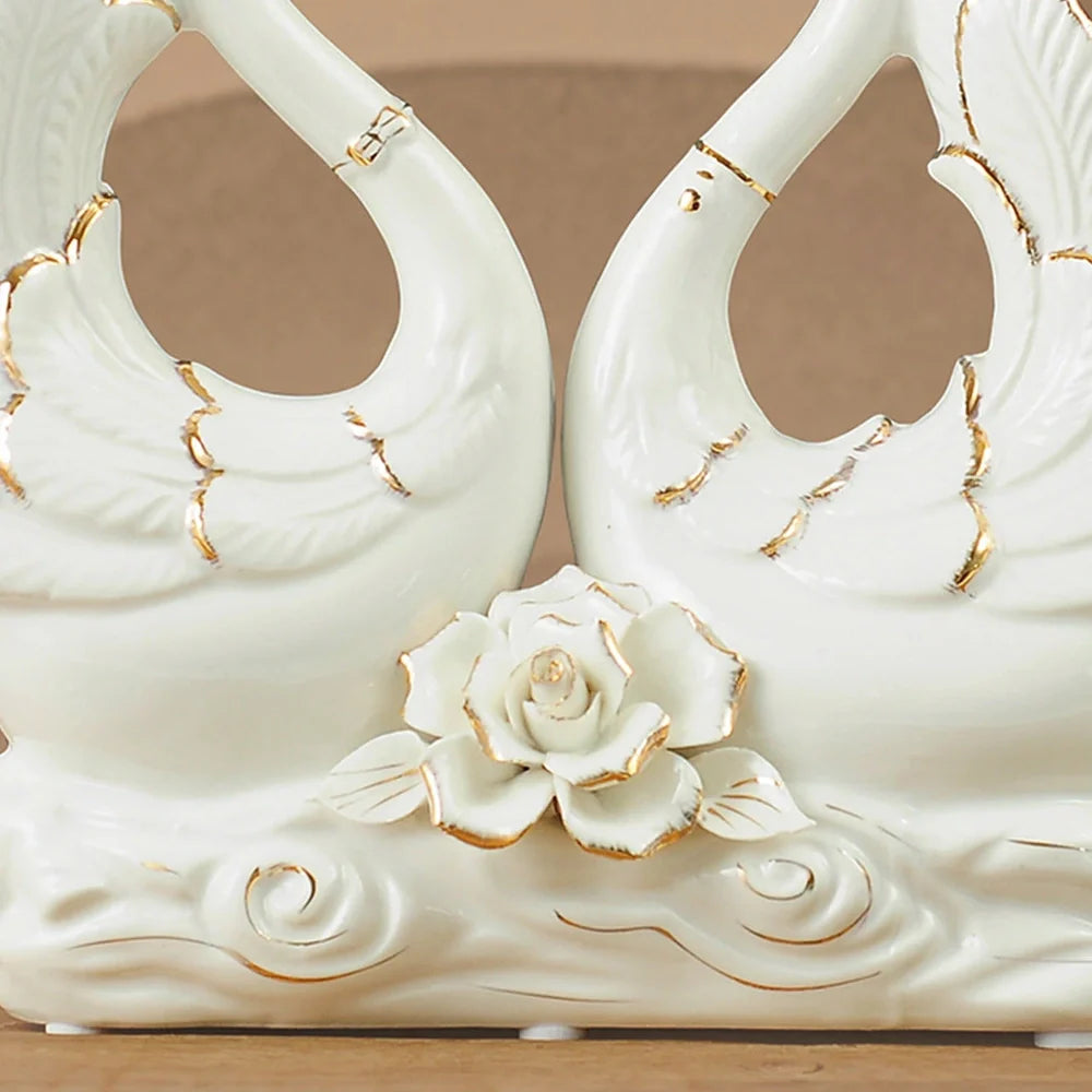 Handmade ceramic swan ornament with glazed surface in porcelain-like material