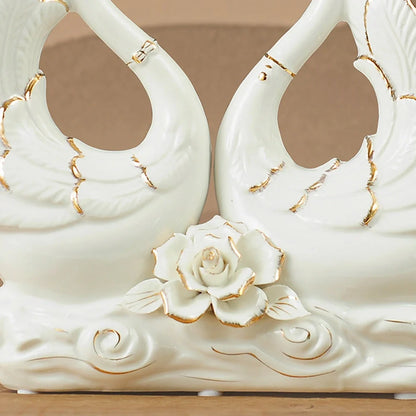 Handmade ceramic swan ornament with glazed surface in porcelain-like material
