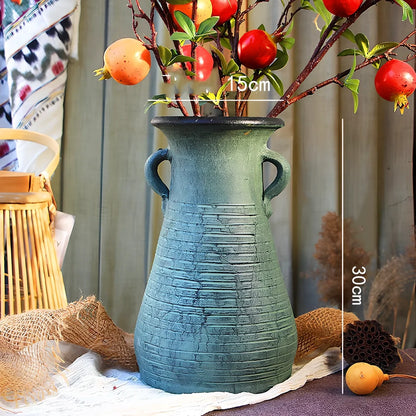 Ceramic mosaic vase with dried flowers, showing mosaic pattern and 25cm height