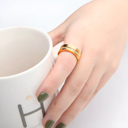 Women's gold geometry ring with angular design and zircon accents on copper base
