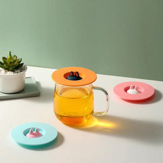 Cartoon cat ear-shaped silicone cup lid in vibrant colors, designed to be spill-proof and dustproof for your daily beverages