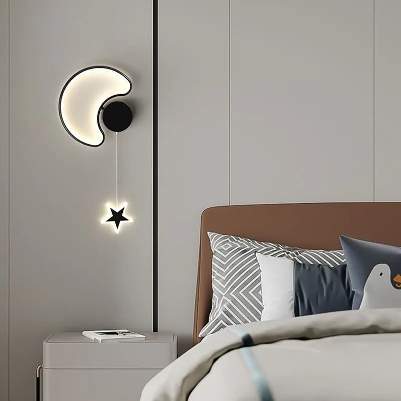 Black five-pointed star shaped children's wall lamp with a left-facing cloud design and touch control for three colour LED light.